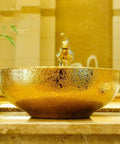 USZWBY Bathroom Vessel Sink, Countertop Basin Round Sink Bathroom Sink Hotel Art Sink Bathroom Sink in golden finish.