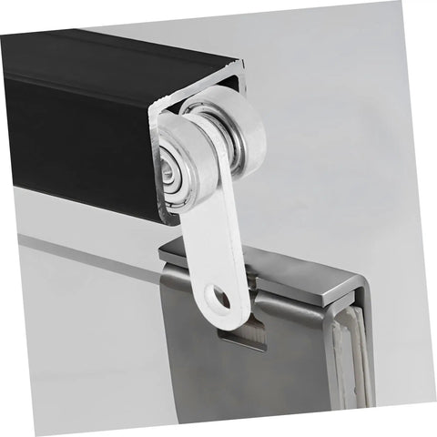 Close-up of Heavy Duty Sliding Door Roller Wheels With Dual Bearing Iron Groove Caster mounted on a track, demonstrating smooth glide functionality.