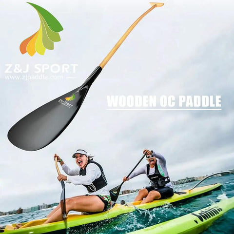 Hybrid Outrigger Paddle With Teardrop Carbon Blade And Fiberglass Reinforced Wooden Bent Shaft For Waka Ama Vaa L 50 Inches on water