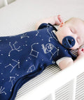 Ultimate Baby Sleep Sack For 4 Season Merino Wool Sleeping Bag With Organic Cotton Outer Temperature Regulating Blanket Adjustable Universal Size 2 To 24 Months Night Sky, featuring a baby asleep in a star-patterned sack.