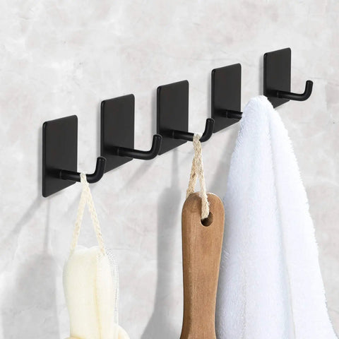 Heavy Duty Adhesive Hooks Black Self Adhesive That Really Grip Holds Towels Coats Keys and More Four Pack on wall