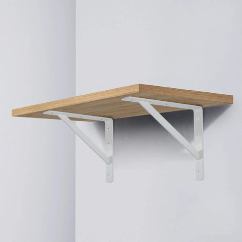 Badass Heavy Duty Metal Shelf Brackets 12 X 8 Inch White L Brackets supporting a wooden shelf on a wall.