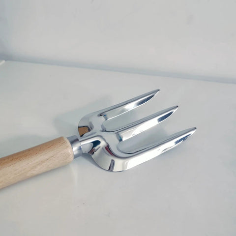 Hand rake from 5 Piece All In One Garden Tool Set With Large Trowel, Transplanter, Weeder, Hand Rake And Cultivator For Quick Digging, Planting And Weeding, Durable Steel Heads And Ergonomic Handles For Easy, Comfy Garden Work on white surface