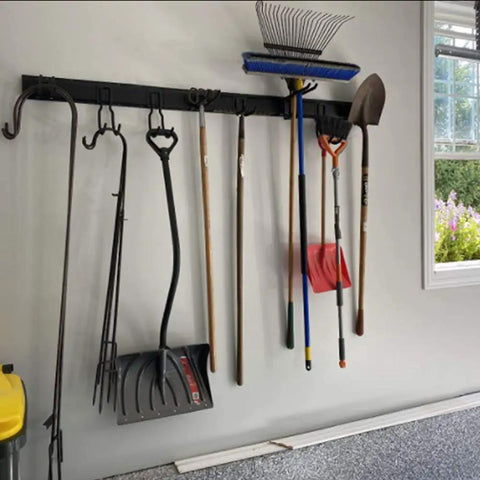 13 Piece Tool Storage Rack Kit With 64 Inch Adjustable Garage Organization Wall Mounted System And 9 Hooks For Heavy Duty Steel Garden Tools, Brooms, Shovels, And More installed with tools hanging