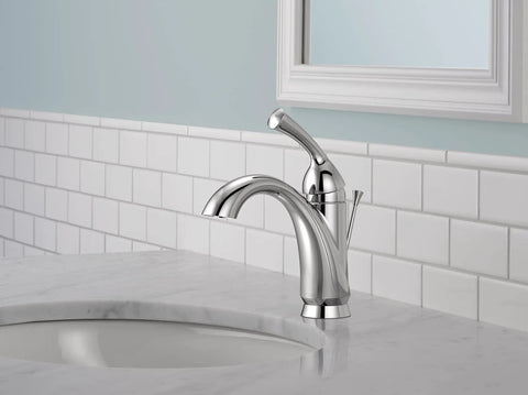 Chrome Haywood Single Hole Bathroom Faucet with One Handle next to sink, featuring Diamond Seal Technology and InnoFlex PEX supply lines.