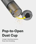 Open dust cup of HOTO 4 in 1 Portable Mini Vacuum showing dirt release, illustrating easy cleaning.