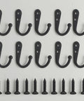 Set Of Ten Tough As Nails Vintage Wall Mounted Coat Hooks In Antique Black Cast Iron With Mounting Hardware for hanging bags and keys.