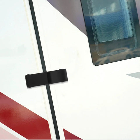 2 Pack Flexible Rubber Draw Latches For Boat Compartments And Cargo Boxes attached to a white surface with window.