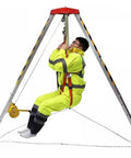 Heavy Duty Rescue Tripod With Adjustable Legs And Self Locking Winch For Confined Space Safety Industrial Fall Protection and Firefighter Emergency Extraction Built Tough And Hella Reliable For Job Sites, with a worker hanging safely.