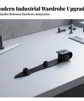 Heavy Duty Sliding Barn Door Hardware Roller With Knockout Smooth Glide Performance And Three Threaded Mounting Posts For Dead Simple Interior Wall Track Kit on a workbench surface.