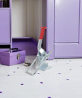Super Heavy Duty Toggle Clamp Latch With 2183 Lbs Holding Capacity Galvanized Iron on a white floor next to purple storage.