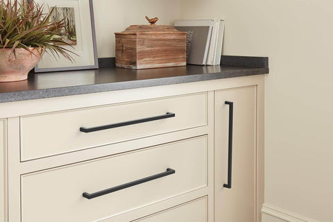 Matte Black Cabinet Pull For Modern Cabinets And Furniture Monument Collection 13 Inch Overall Length 12 5 8 Inch Center To Center Mounting Durable Metal Drawer Pull Amerock BP36911FB installed on light cabinets