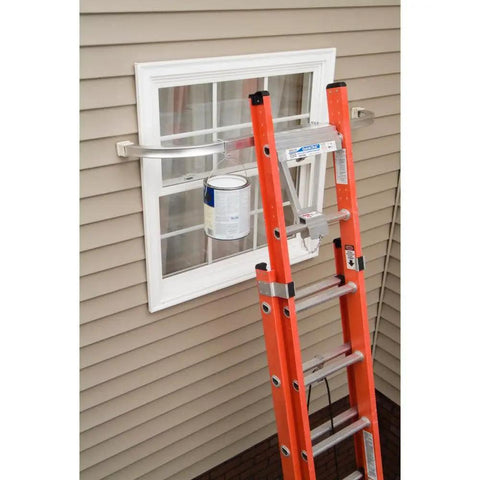 Heavy Duty Ladder Stabilizer For 45 Inch Ladders With Quickclick Lock installed on orange ladder near window for painting