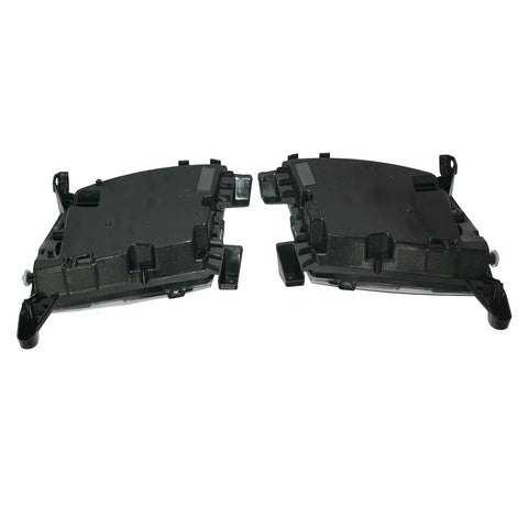 High Grade Pair Driving Fog Lights Boasting Hella Bright Glow And Snazzy Clear Lens Built To Drop Right Into Tesla Model S 2012 To 2020 US Spec Front Bumper Upgrade Kit, showing the durable black housing.