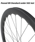 Close-up of Carbon Fiber Road Bike Wheelset 50mm Deep 700c Clincher Tubeless Disc Center Lock Rims Wave Profile