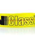 Close-up of yellow strap from Yellow Series 2 Inch Complete Axle Tie Down System Heavy Duty Kit With Two 22 Inch And Two 36 Inch Axle Straps