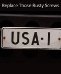 Rusty screws on a car license plate highlighting the need for Four Pack Stainless Steel License Plate Screws With Slotted Hex Heads.