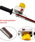 Nifty Mini Electric Belt Sander Packed With A Grippy Handle And Ten Sturdy.4 By 13 Inch Sanding Belts Boasts Seven Smooth Speed Settings For No Sweat Wood Crafting And Fast Metal Polishing Daily, showing compact design and motor.