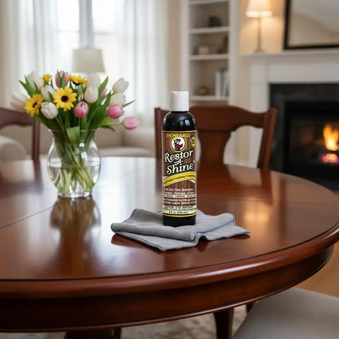 Top Shelf Wood Polish And Gloss Restorer To Wipe Away Scratches Haze And Dust For A Slick New Finish On Antique Cabinets And Wooden Dining Tables Without Breaking A Sweat on a polished wooden table.