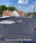 Heavy Duty Liquid Waterproofing Membrane Kills Leaks And Stops Cracks Cold On Roofs Decks And Bathrooms applied on a flat roof.
