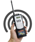 Hand holding completed walkie-talkie from Walkie Talkie Soldering Practice Kit With Interactive Circuit Board And 104 Parts For Beginners Starter Friendly