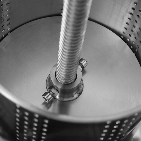 Inside view of Heavy Duty T Handle Fruit Wine Press With Dual Stainless Steel Barrels, showing stainless steel drum and screw mechanism.