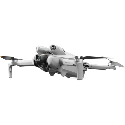 Mini 4 Pro Fly More Combo With RC 2 Screen Remote, 4K Video Aerial Drone Under 249g in flight position, side view