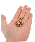 Hand holding 25 Pcs Mini Brass Barrel Hinges For Jewelry Boxes And Wooden Cabinet Doors Hidden Concealed Cylindrical Design