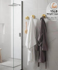 Heavy Duty Suction Cup Hooks For Shower Stainless Steel No Drill Mounts With Strong Vacuum Grip holding towels in a bathroom