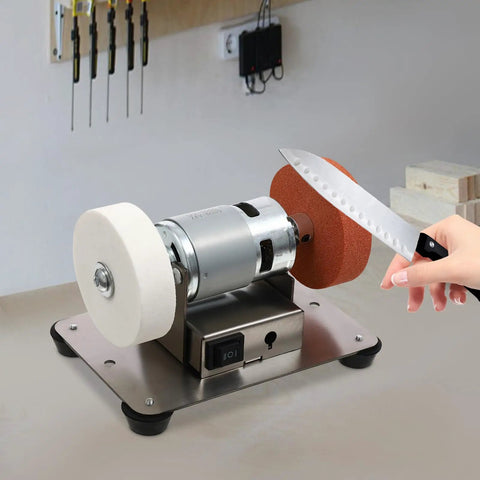 No Nonsense Mini Bench Grinder Rockin A Beefy 96W Copper Motor used for sharpening a knife with adjustable speed settings.