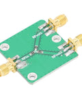 Real Deal Two Way RF Power Splitter Module And Signal Dividing PCB Board Offering Six Decibel Attenuation With Straight Up Reliable DC To Five Gigahertz Operation Period, showing SMA ports and PCB layout.