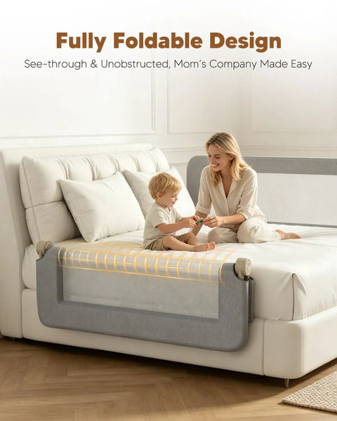 75 Inch Foldable Toddler Bed Rail With Reinforced Carbon Steel Frame Breathable Washable Fabric Guard shown folded down on bed