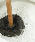 Heavy Duty Rubber Toilet Plunger With Solid Wooden Handle For Bathroom Sink Drains And Tub Clogs in toilet water.