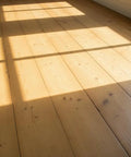 Top Shelf Golden Oak Reactive Wood Stain Gonna Give Your Woodwork That Classic Amber Glow Without The Messy Drama Featuring A Water Based Formula That Bonds With Natural Tannins For A Heritage Craftsman Ready Finish on restored light wooden floor.