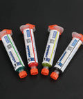 Four tubes of colored paste for Flux Repair Kit With Light Curing Liquid No Clean Flux For PCB BGA Boards Includes Precision Needles And Flashlight.
