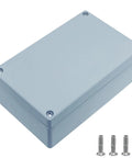 Heavy Duty Aluminum Alloy Junction Box With IP66 Waterproof Seal Provides Rock Solid Gray Enclosure Built Like A Tank For Tough Outdoor Electrical Projects Measures Six By Four By Three Inches, top view with screws.