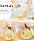 Potato masher with stainless steel blades and black handles; kitchen tool for mashing potatoes