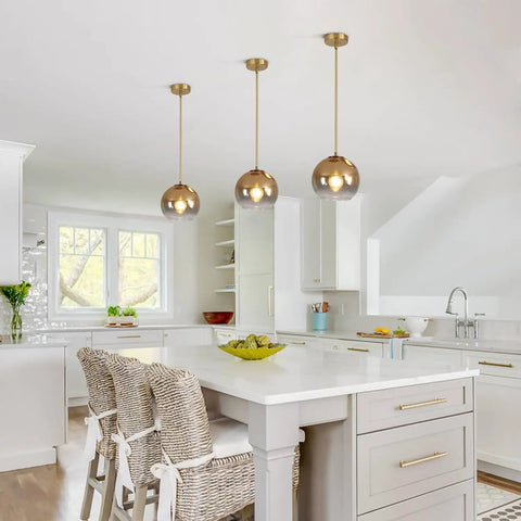Gradient Gold Glass Pendant Light For Kitchen Island over white island in bright kitchen, modern vintage hanging lamp style
