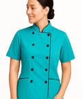 Pro Level Short Sleeve Tailored Fit Chef Jacket For Women Smooth Turquoise Double Breasted with cloth buttons and thermometer pocket.