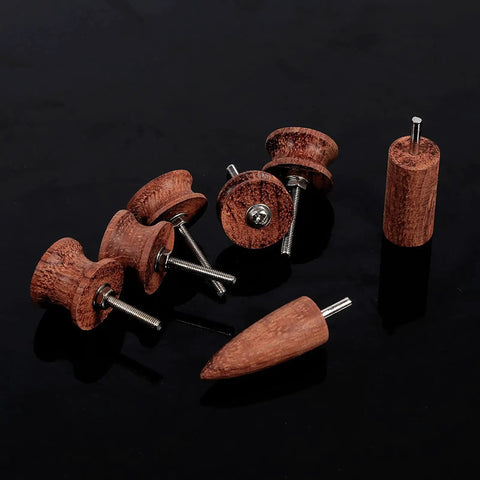 Pointed burnisher slicker and wooden Dremel bits from Premium Rosewood Leather Craft Set for clean edge work.