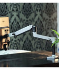 Slick Aluminum Desktop Clamp Monitor Mount For 17 To 32 Inch Screens With Smooth Full Motion Spring Arm on desk