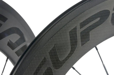 Close-up of 88mm Carbon Fiber Wheelset For 700C Clincher, 23mm Inner Width, 3K Matte Rim, showing the carbon weave texture.