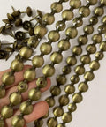 Top Shelf Heavy Duty Brass Upholstery Tack Strips With 11mm Decorative Nail Heads, showing brass strips and nails for furniture projects.