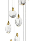 Slick 12 Light Modern Pendant Light Legit Black Polished Gold Steel Build With Crisp Clear Crystal Glass Fresh Hanging Fixtures Kickin It Clean For Kitchen Islands Totally Adjustable Cord Design hanging from ceiling with clear crystal features.
