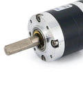 Built Tough DC Geared Motor For Wheelchairs And Industrial Power Systems 12V 24V High Torque Electric Gearbox with 8mm Shaft close-up view.