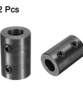 Two black oxide steel rigid shaft couplings with 1/2 in bore, 1 in OD, 1-1/2 in length and two set screws.