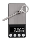 SHONAN heavy-duty 316 stainless steel eye bolt with nut and washer on a brushed metal plate displayed on a digital scale