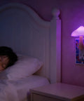 Child sleeping beside 4 Pack Mushroom Night Lights Plug In Sensor Lamps With Auto On Off In The Dark Color Changing LED Night Lights