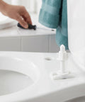 Close-up of toilet seat with 10 Piece Toilet Seat Bolt Kit With Plastic Screws Nuts And Washers, easy install