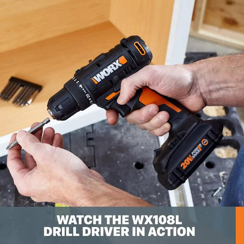 Hand holding 20V Cordless Drill Driver with 84 Piece Accessory Kit, Variable Speed, Lightweight Design, 3 8 Inch Keyless Chuck